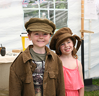 Children try on military uniform at the Staffordshire Regiment Museum